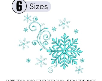 May include: An embroidery design featuring a large light blue snowflake, smaller snowflakes, and swirling flourishes. The text 6 Sizes appears in a circle at the top, and the file formats DST, EXP, PES, HUS, VIP, VP3, SEW, JEF, and XXX are listed below.