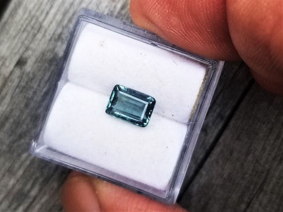 Unique Teal Sapphire 7x5 MM Emerald Cut