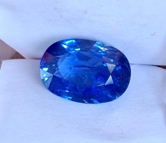 Neon Blue Sapphire 10.85x7.59 Cts Oval Shape , September Birthstone