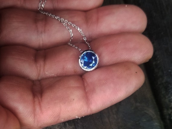 14K Gold Sliding Bezel 7 MM Round Blue Sapphire