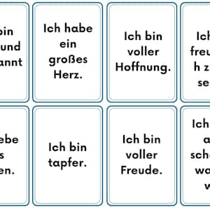 May include: Eight rectangular cards with teal borders and white backgrounds. Each card has German text in black. The phrases include "I am calm and relaxed," "I have a big heart," and "I am full of hope."