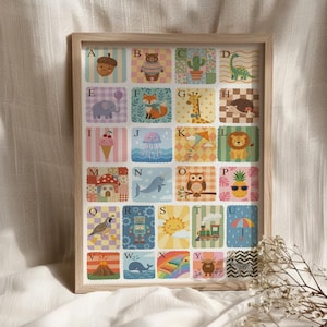 May include: A framed alphabet art print featuring colorful illustrations of animals and objects, each paired with a letter. The artwork includes a bear, fox, giraffe, lion, and other charming designs, perfect for a child's room or nursery.