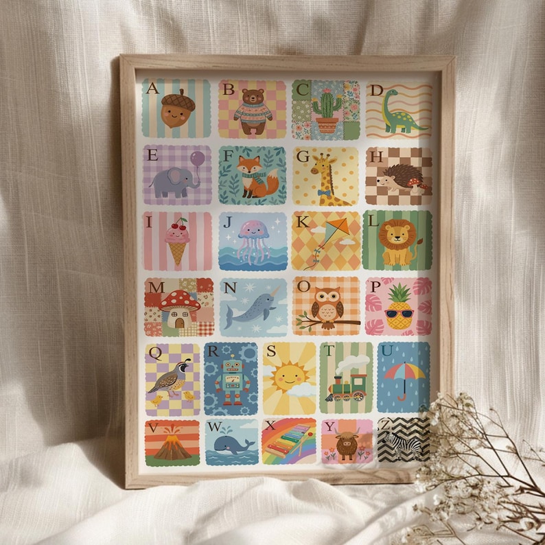 May include: A framed alphabet art print featuring colorful illustrations of animals and objects, each paired with a letter. The artwork includes a bear, fox, giraffe, lion, and other charming designs, perfect for a child's room or nursery.