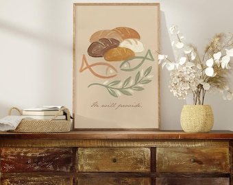 May include: A framed art print featuring a beige background with illustrations of bread loaves, fish, and a sprig of leaves. The text "He will provide" is written in a script font. The artwork is displayed on a wooden cabinet.