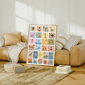 May include: A framed alphabet poster featuring colorful illustrations of animals and objects, each representing a letter. The artwork includes a bear, cactus, dinosaur, elephant, fox, giraffe, lion, and more. The poster is displayed in a living room setting.