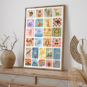 May include: A framed alphabet poster featuring colorful illustrations for each letter. The artwork includes images of an acorn, bear, cactus, dinosaur, elephant, fox, giraffe, hedgehog, ice cream, jellyfish, kite, lion, mushroom, whale, owl, pineapple, quail, robot, sun, train, umbrella, volcano, whale, rainbow, yak, and zebra.