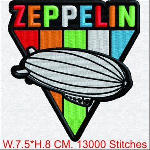 May include: Embroidered patch featuring the word "ZEPPELIN" in colorful letters above a white airship design. The patch is set against a black and multi-colored triangular background. The patch measures 7.5 cm wide by 8 cm high.