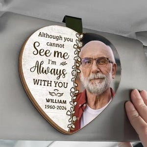 May include: A wooden heart-shaped car visor ornament with a photo of a man and the text "Although you cannot see me, I'm always with you." The ornament includes the name "William" and the years "1960-2024."