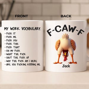 May include: White ceramic mug with the text "MY WORK VOCABULARY" and a list of expletives. The back of the mug features a cartoon chicken and the text "F-CAW-F" and the name "Jack".