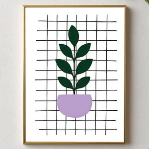 Puede incluir: Una impresión artística enmarcada con una ilustración estilizada de una planta en una maceta morada. La planta tiene hojas de color verde oscuro. El fondo es una cuadrícula negra sobre un fondo blanco. El marco es dorado.