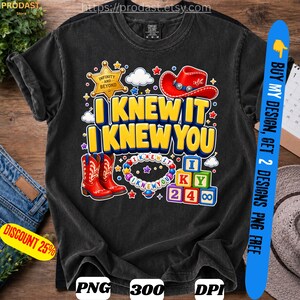May include: A black short-sleeve t-shirt featuring a graphic print with the text I KNEW IT I KNEW YOU, a gold sheriff star, a red cowboy hat, red cowboy boots, a beaded bracelet with the text I KNEW IT I KNEW YOU, and colorful alphabet blocks.