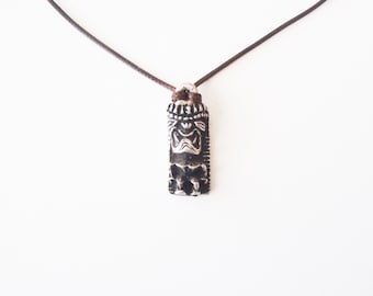 TIKI Pendant Necklace on Braided Cord: Classic Polynesian Spiritual Effigy in Silver— Hawaii, Surf Culture, Tiki Culture, Hawaiiana, Tikiana