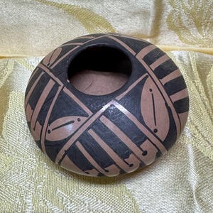 May include: A rustic wooden sign with the text "Welcome to our home" in a handwritten style. The sign features a distressed finish and a simple, inviting design, perfect for a front porch or entryway.