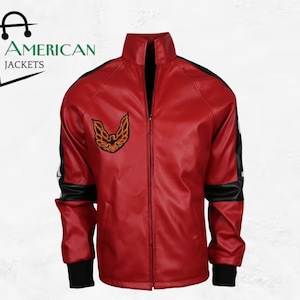 May include: A red leather jacket with black detailing on the collar, cuffs, and sleeves. It has a full-length zip and an embroidered emblem on the chest. The text "AMERICAN JACKETS" is in the upper left corner.