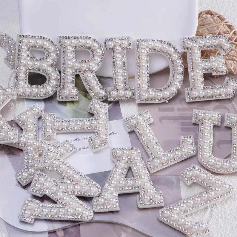 “Set of pearl and rhinestone chenille letter patches for personalized gifts and bags, including letters A to Z and BRIDE design.”