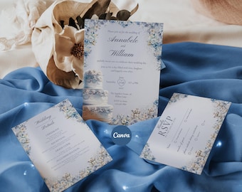 May include: Wedding invitation suite featuring a main invitation card, RSVP card, and details card. The cards have a floral design with blue and white accents. The invitation includes the names Annabele and William.
