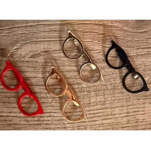 Clip para gafas con marco redondo (4 colores disponibles)