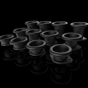 May include: A collection of black, funnel-shaped objects with a wide, rounded opening and a flat base. The objects are arranged in a group, with some having a square base with holes. The background is a solid black.