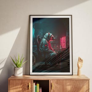 May include: Framed art print featuring a bear-like figure in a hoodie, seated in front of a computer with a red glowing screen. The artwork has a futuristic, cyberpunk aesthetic with a dark, moody color palette.