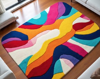 Tappeto in lana trapuntato a mano, astratto e colorato, moderno e di design, perfetto per arredare la zona giorno.