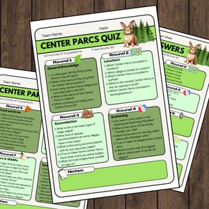 May include: A quiz sheet with the title "Center Parcs Quiz" and various rounds with questions. The sheet has a green and white color scheme, with a cartoon rabbit graphic. The total score is 50.