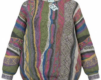 May include: A colorful, patterned sweater with a crew neck and long sleeves. The sweater features a variety of vertical stripes in shades of green, pink, blue, yellow, and gray. A tag is attached to the sweater.