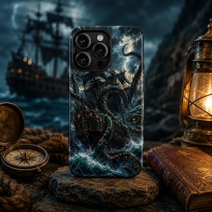 May include: A smartphone case featuring a dark, stormy ocean scene with a large wooden sailing ship being ensnared by the massive, winding tentacles of a sea monster amidst crashing waves, lightning, and a turbulent, dark, cloudy sky.