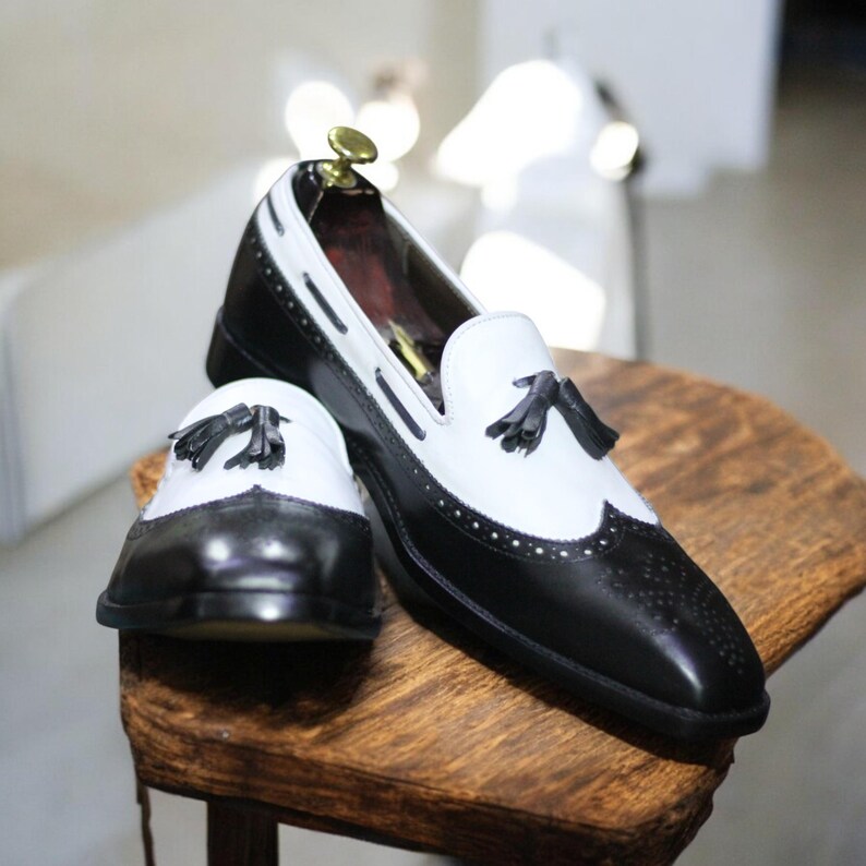 Top view showcasing premium full-grain leather and smooth finish of the loafers.