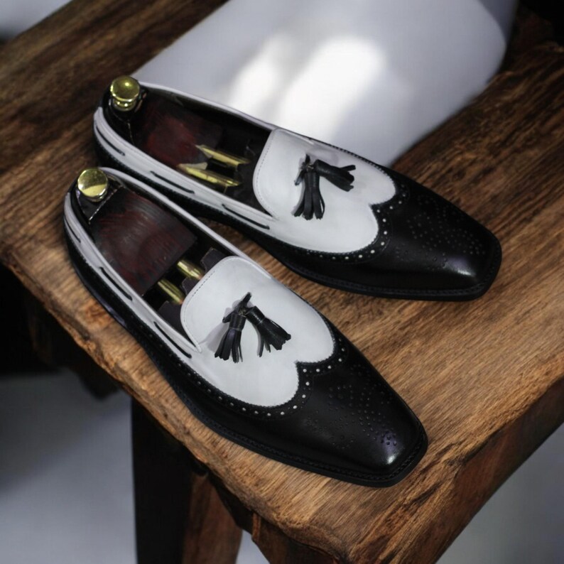 Top view showcasing premium full-grain leather and smooth finish of the loafers.