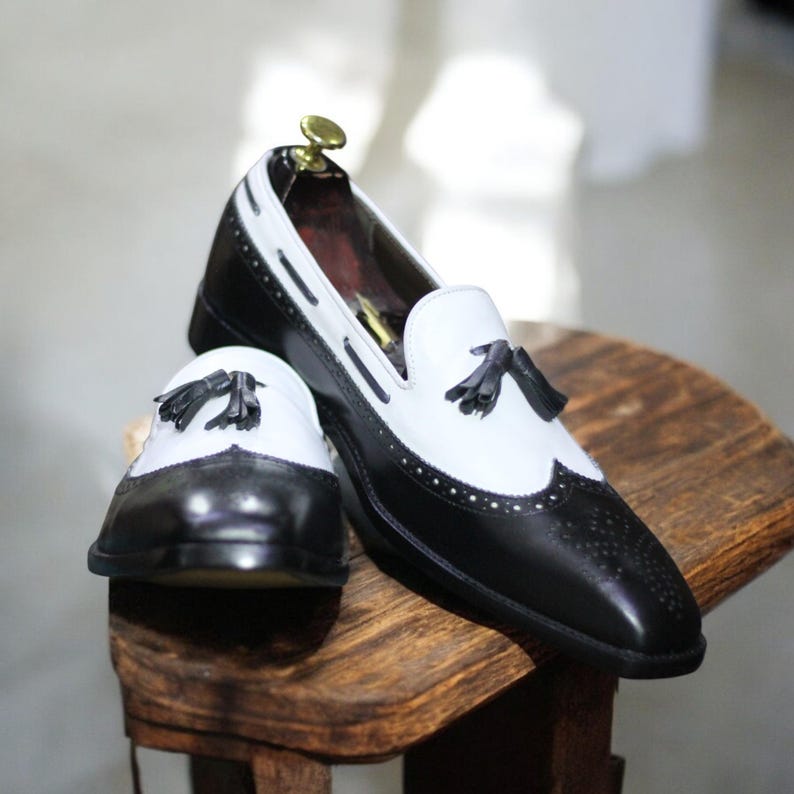 Top view showcasing premium full-grain leather and smooth finish of the loafers.