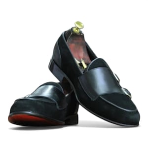 Men's luxury black suede and leather double monk strap shoes.