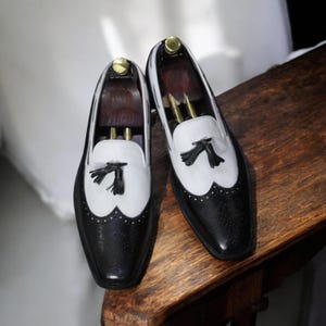 Top view showcasing premium full-grain leather and smooth finish of the loafers.