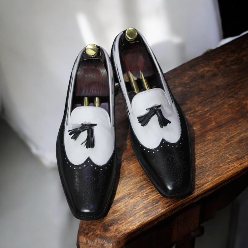 Top view showcasing premium full-grain leather and smooth finish of the loafers.