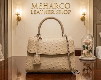 Borsa a mano Meharco beige con manico superiore effetto struzzo – Borsa a tracolla strutturata
