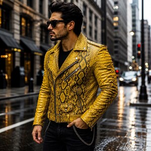 May include: A yellow motorcycle jacket with a snakeskin pattern, featuring a notched lapel, silver-tone metal zippers, a front flap pocket with a snap button, and an adjustable waist belt with a buckle, worn over a plain black shirt.