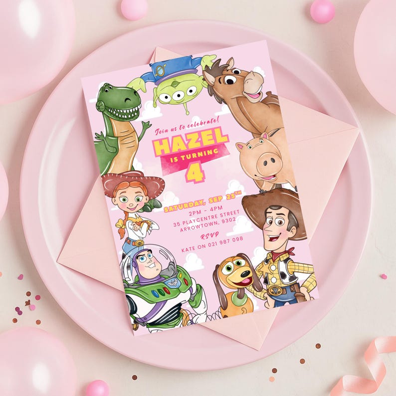 May include: A pink Toy Story themed invitation card. The card features various characters from the film and the text "Join us to celebrate! HAZEL IS TURNING 4" along with event details. It rests on a pink plate with a pink envelope.