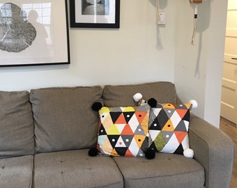 Modern Throw Pillow with giant handmade pompoms Bring life to your space!