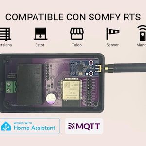 以下が含まれることがあります： 紫色の回路基板、アンテナ、および「COMPATIBLE CON SOMFY RTS」のテキストを備えた黒い電子デバイス。ブラインド、日よけ、センサーのアイコンが含まれています。このデバイスは、Home AssistantおよびMQTTと互換性があります。