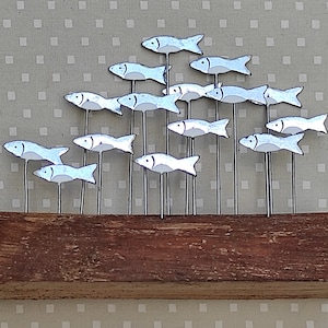 Little Shoal Of Silver Fish On Wood Fish Decoration Shoal Of Fish Sprats Sardine Decoration image 1