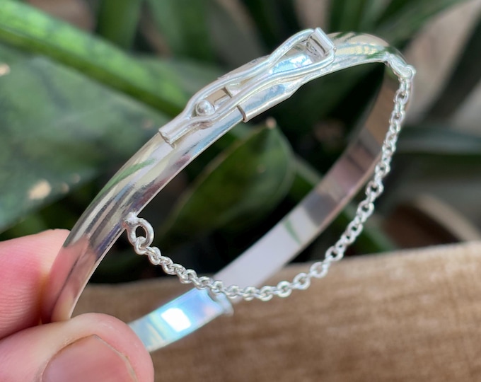 Featured listing image: Handcrafted Silver Bangle Bracelet with Safety Chain and Secure Lock Clasp