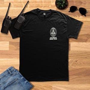 John Nolan Badge, Los Angeles Rookie Police T-Shirt - Fan Gift - Unisex