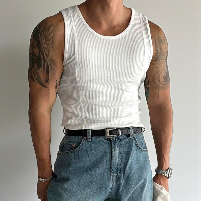 Men's Ribbed Tank Top | Slim Fit Muscle Vest | Casual Elastic Streetwear | Basic Training Shirt | Lightweight Gymwear
.
Men's ribbed sleeveless knit tank top with slim fit, designed for casual streetwear, gym, or summer layering in a minimalist fashion style.