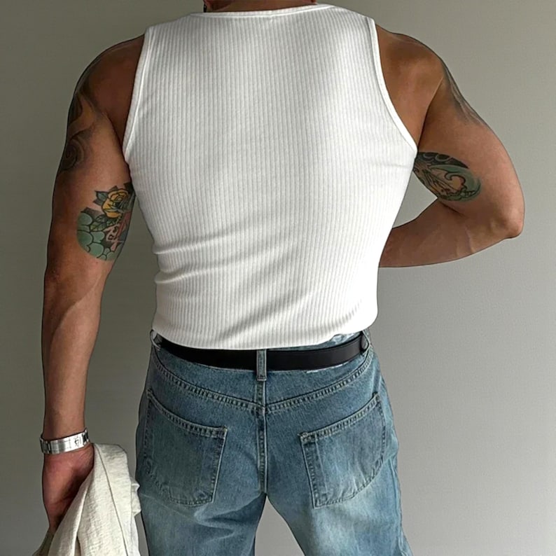 Men's Ribbed Tank Top | Slim Fit Muscle Vest | Casual Elastic Streetwear | Basic Training Shirt | Lightweight Gymwear
.
Men's ribbed sleeveless knit tank top with slim fit, designed for casual streetwear, gym, or summer layering in a minimalist fashion style.