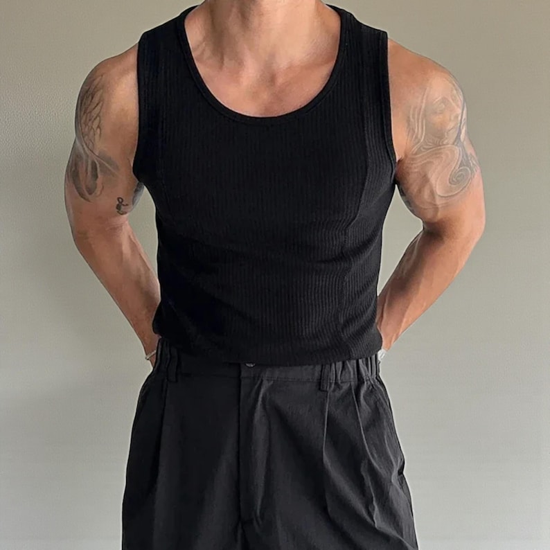 Men's Ribbed Tank Top | Slim Fit Muscle Vest | Casual Elastic Streetwear | Basic Training Shirt | Lightweight Gymwear
.
Men's ribbed sleeveless knit tank top with slim fit, designed for casual streetwear, gym, or summer layering in a minimalist fashion style.