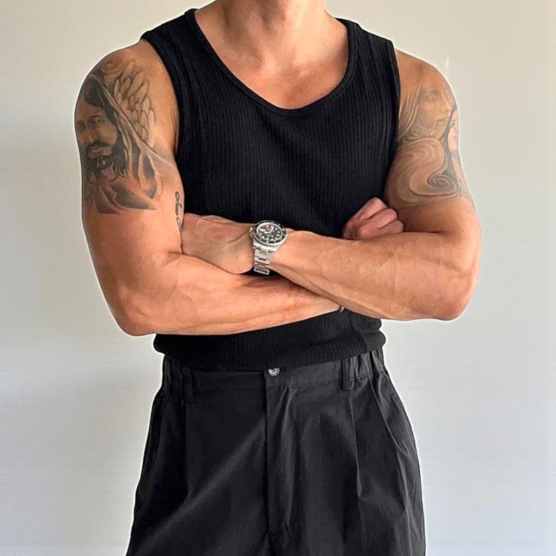 Men's Ribbed Tank Top | Slim Fit Muscle Vest | Casual Elastic Streetwear | Basic Training Shirt | Lightweight Gymwear
.
Men's ribbed sleeveless knit tank top with slim fit, designed for casual streetwear, gym, or summer layering in a minimalist fashion style.