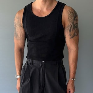 Men's Ribbed Tank Top | Slim Fit Muscle Vest | Casual Elastic Streetwear | Basic Training Shirt | Lightweight Gymwear
.
Men's ribbed sleeveless knit tank top with slim fit, designed for casual streetwear, gym, or summer layering in a minimalist fashion style.