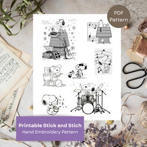 May include: A black and white PDF embroidery pattern featuring Snoopy playing musical instruments. The image includes Snoopy playing drums, guitar, and a record player. The text reads "Printable Stick and Stitch Hand Embroidery Pattern."
