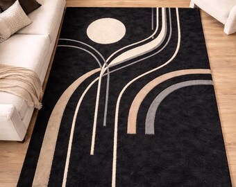 Handtuftad ullmatta | Geometrisk art déco-matta, svart och krämfärgad fodrad matta