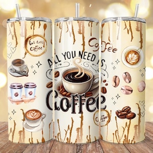 May include: A set of three stainless steel coffee tumblers with straws. The tumblers feature a beige background with brown drip patterns and coffee-themed illustrations, including coffee beans, cups, and the text "All You Need Is Coffee."
