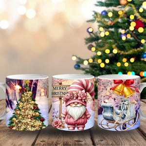 May include: Three white ceramic mugs with Christmas-themed designs. One mug features a decorated Christmas tree, another a gnome with a "Merry Christmas" sign, and the third a sleigh with bells. The mugs are on a wooden surface.
